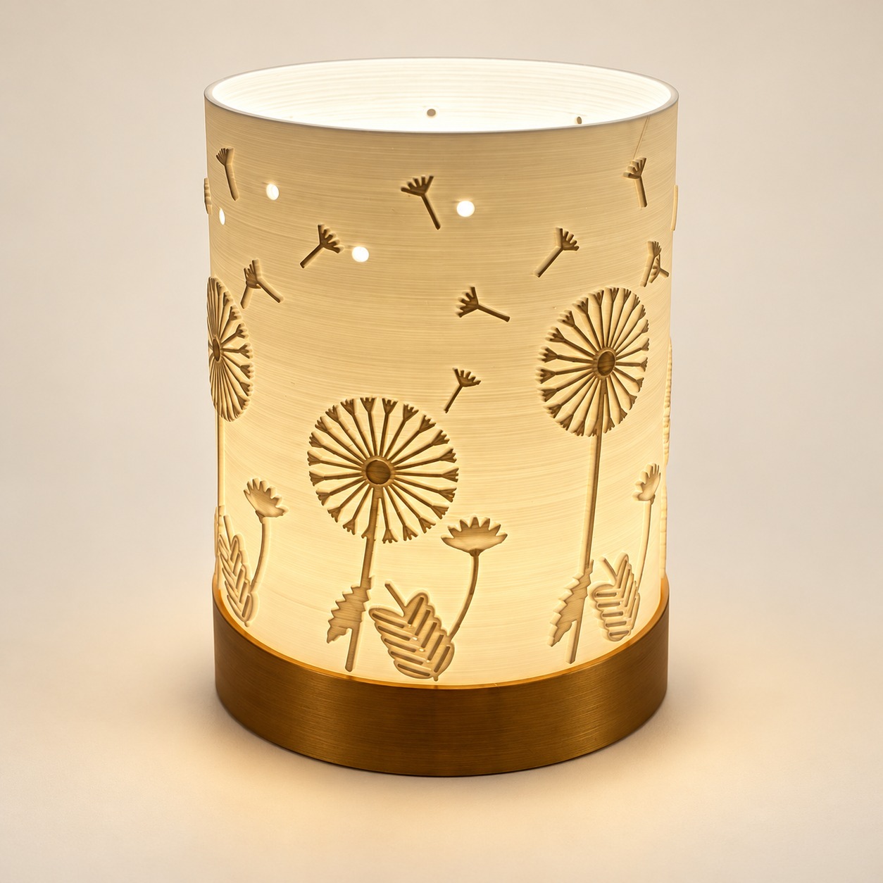 Beleuchtete Pusteblumen-Lampe mit feinem Blütenrelief, kleinen Lichtpunkten und goldfarbenem Sockel